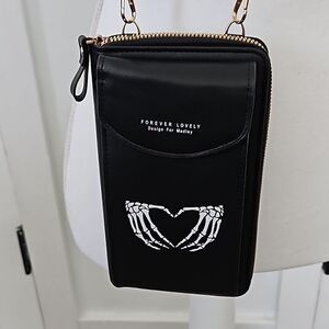 NWOT Crossbody black handbag/wallet with skeleton hands